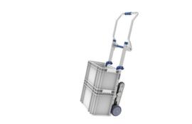 Holder for plastic box for electric stair climber